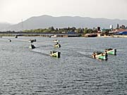 Fishing Boats on Kampot's Teuk Chhou River by Asienreisender